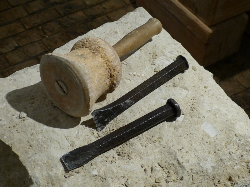 stone, high angle view, rusty, nail, focus on foreground, indoors, hammer, simplicity, statue, nature, number, still life, wall - building feature, steinmetz career