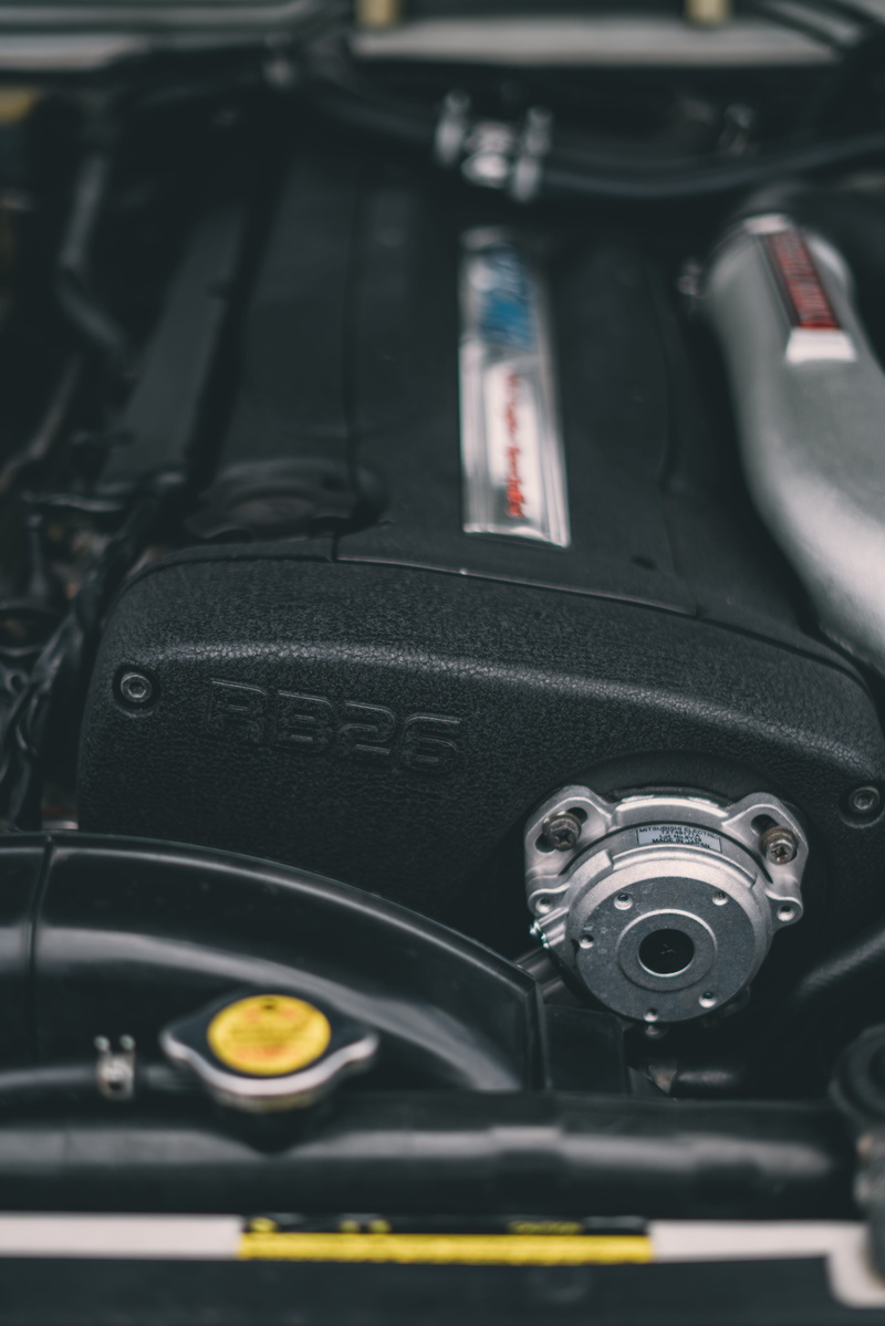 mode of transportation, tire, control, symbol, communication, part, vehicle, automobile, equipment, indoors, car, tachometer, closeup, electronics, camera - photographic equipment
