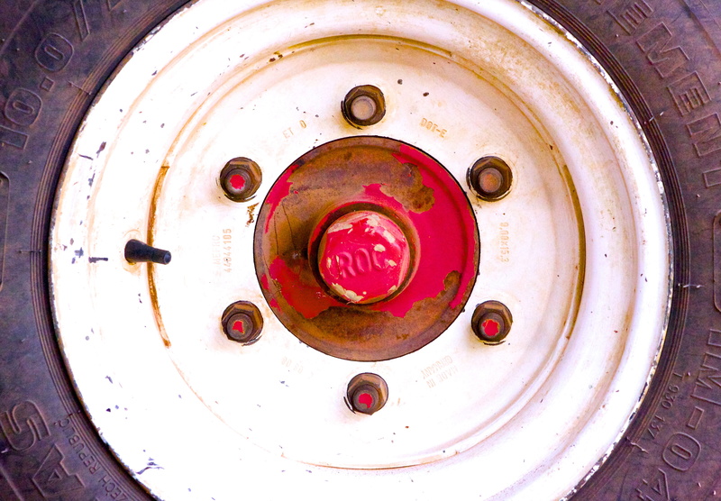 building, geometric shape, sink faucet, brake, rusty, droplet, machinery, steel, outdoors, clock tower, rust, alloy wheel, indoors, drive shaft, circle