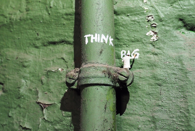 plant, pipe, creativity, focus on foreground, little man, no people, metal, representation, text, tube, mite, trunk, green color, steel, protection, tree trunk