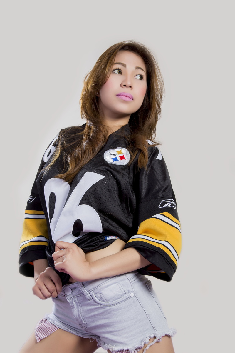 portrait, steelers, jersey, brown hair, looking at camera, shirt, standing, adult, three quarter length, studio shot, black, women, young adult, one person