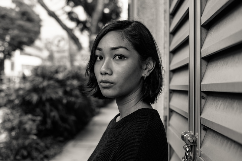 photography, beside, grayscale, lifestyles, portrait, day, woman, real people, young adult, one person, standing, women, louvered, leisure activity, hairstyle