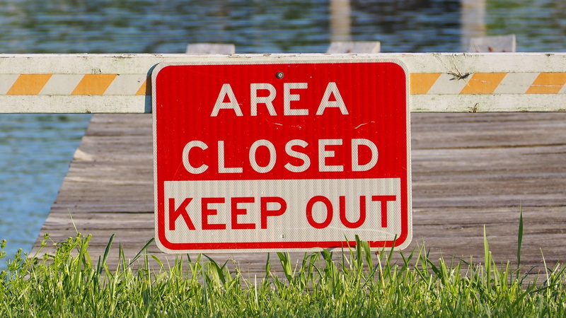 focus on foreground, restricted, warning sign, wood - material, information, no people, day, keep, outdoors, keep out, area closed, safety, plant, prohibited