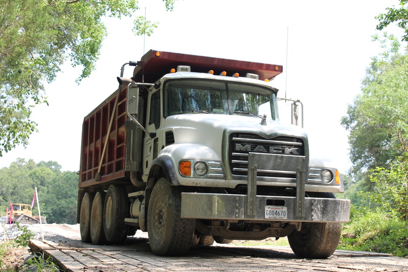 travel, stationary, tree, land vehicle, sky, plant, truck, land, clear sky, bulldozer, mode of transportation, transportation, construction site, earthmover