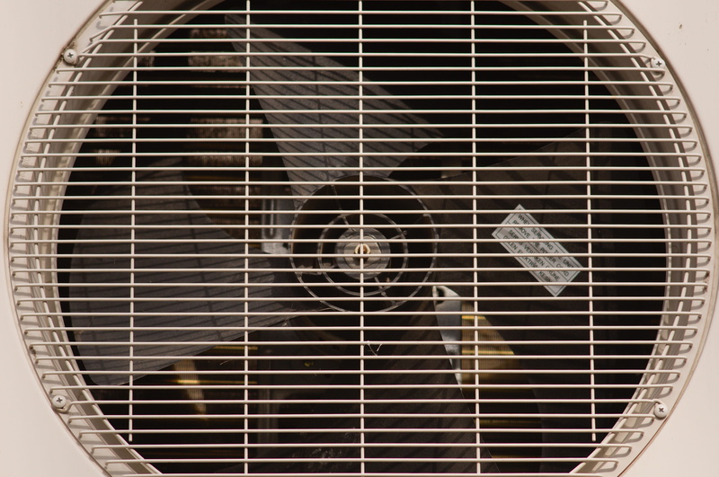 grid, close-up, shape, no people, geometric shape, communication, focus on foreground, single object, full frame, supercharger, backgrounds, fan, air conditioning