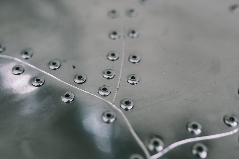 textured, mode of transportation, plates, close-up, technology, rivet - Work Tool, rivets, control panel, transportation, indoors, Metal, background, macro