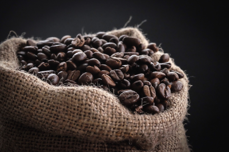 black background, sack, phtoography, indoors, food, roasted coffee bean, seed, food photography, angled, focus, grind, freshness, moody, coffee, abundance