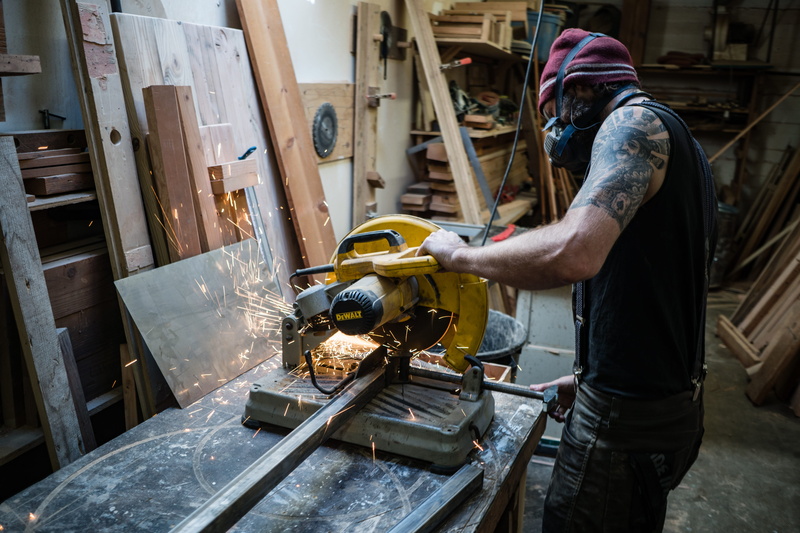 using, saw, 5K, metal crafting, blacksmith, men, work tool, miter, equipment, tank, standing, occupation, man, workshop, metal work, business, adult, working