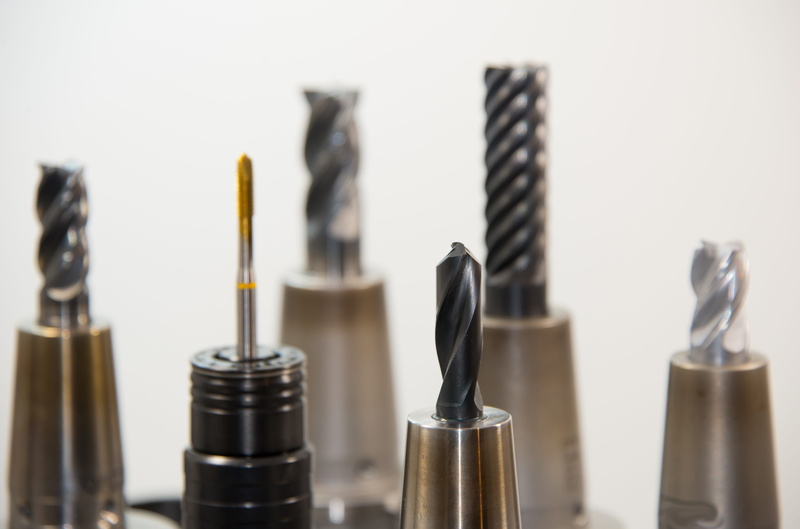 selective focus, studio shot, indoors, zerspahnung, wood - material, container, ingenieuerwesen, no people, close-up, metal, creativity, zerspahnen, art and craft