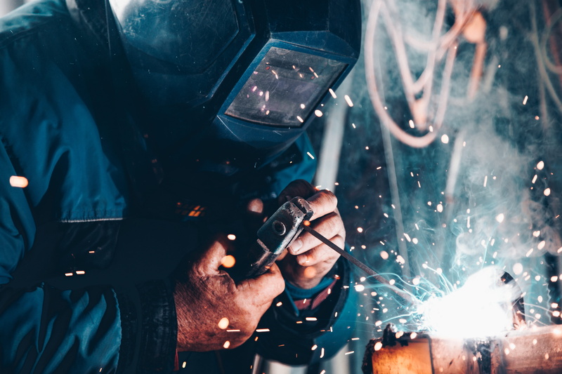 flare, dark, work, man, protection, protective mask - workwear, indoors, effort, sparks, adult, males, industry, holding, occupation, welding, person, workshop