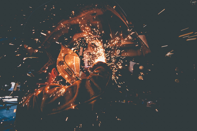 grinding, firework - man made object, glowing, lights, untitled, holding, nature, night, sparks, heat - temperature, celebration, motion, real people, dark