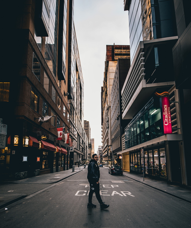men, streetphotography, outdoors, young, city, jay walking, transportation, canada, direction, real people, building, sky, narrow street, melbourne, city street