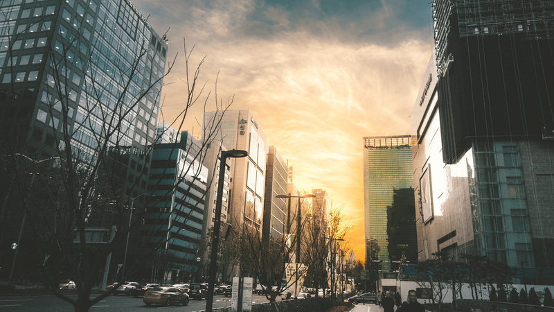 motor vehicle, cloud - sky, car, outdoors, gangnam, building exterior, cbd, skyscraper, sunset, mode of transportation, architecture, sky, building, travel
