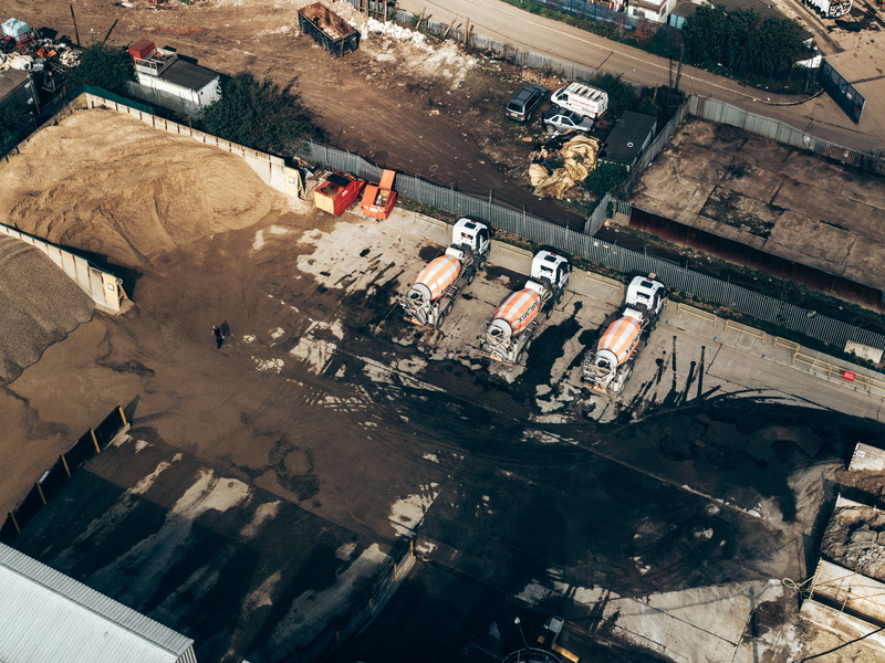 sunlight, road, outdoors, bird, nature, cement, trucks, aerial view, s, truck, construction, no people, high angle view, scenery, eye, concrete, park, work