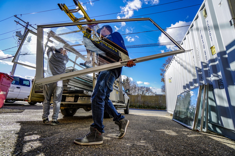 architecture, window, sky, real people, workers, window install, working, clothing, glass movers, young adult, full length, glass window, big windows, window installer