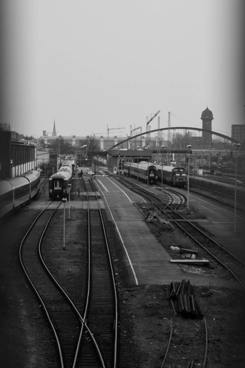 railroad track, clear sky, travel, train car, train, railway, building exterior, outdoors, 2K, transportation, railyard, shunting yard, day, public transportation