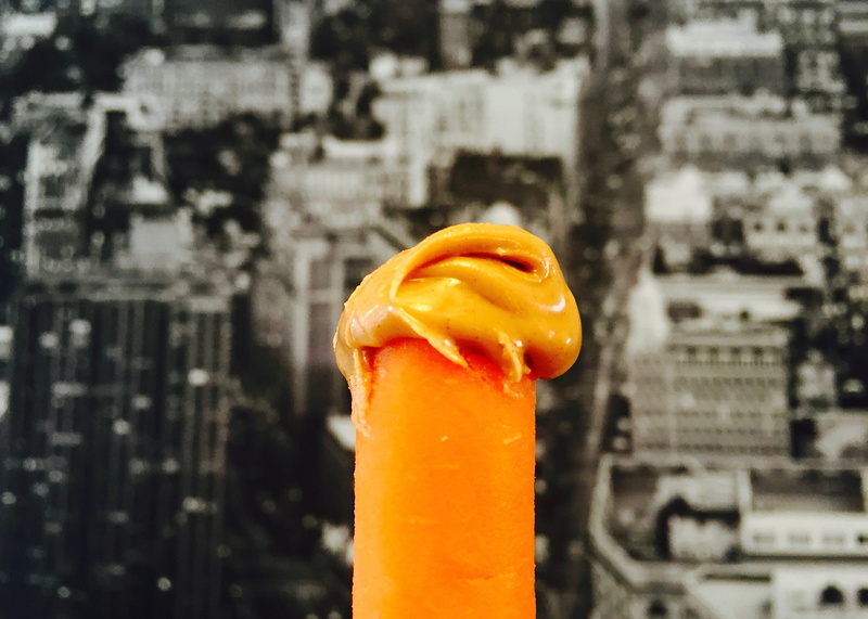 no people, day, architecture, frozen food, orange color, food and drink, focus on foreground, freshness, city life, close-up, food, glass, drink, melting