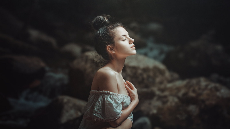 profile view, white tops, looking up, eyes closed, outdoors, portrait, waist up, looking, closed eyes, arms crossed, looking away, one person, focus on foreground