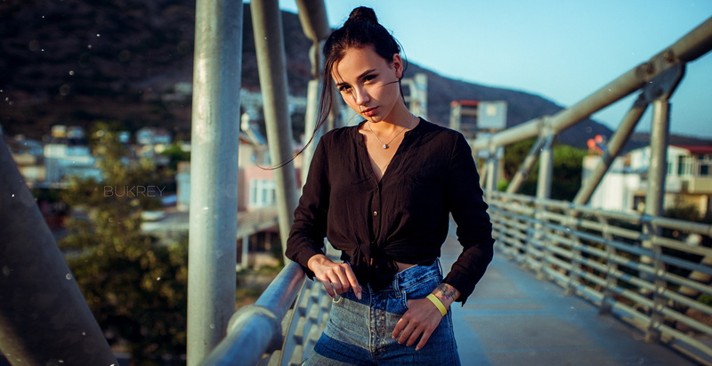 looking, bridge, beautiful woman, outdoors, women, three quarter length, young adult, front view, one person, day, tattoo, standing, women outdoors, hairbun