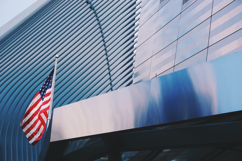 modern art, architecture, clean, low angle view, manhattan, american flag, reflection, outdoors, america, office, office building exterior, sky, patriotism