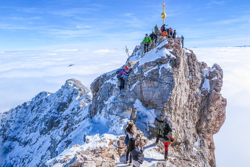 height, outdoors, mountaineering, real people, rock, zugspitze massif, group of people, summit, steep, mountain range, climbing, alpine, snow, adventure