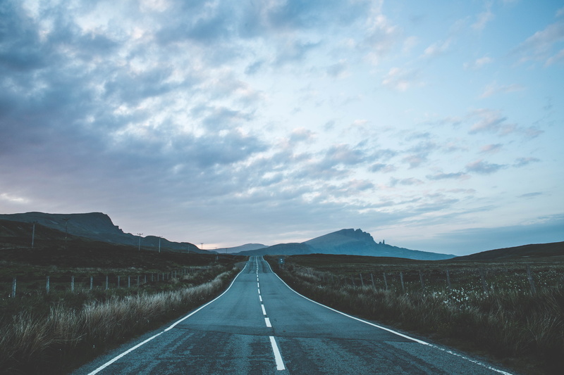 sky, dividing line, mountains, sign, asphalt, mountain, sunset, travel, road, uSA, surface level, vanishing point, scenics, scenics - nature, portree, no People