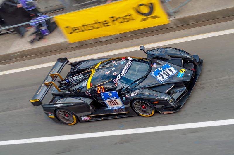 city, 4K, mode of transportation, speed, car, touring car, rear wing, pit crew, racing car, motor vehicle, car racing, 24-hour race, architecture, land vehicle