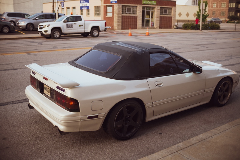 motor vehicle, rx7, stationary, day, transportation, 4K, car, outdoors, built structure, Rx-7, luxury, high angle view, architecture, focus on foreground