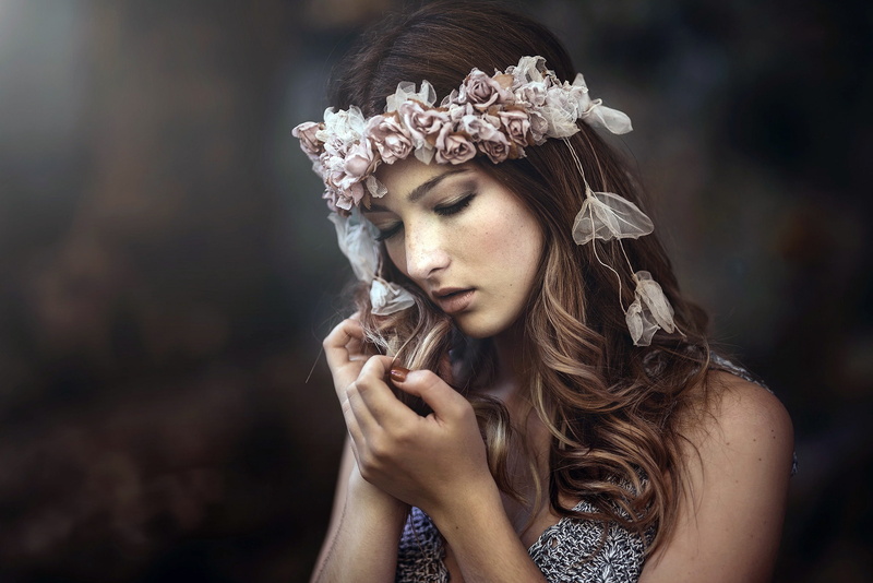 hairstyle, clothing, headdress, headshot, model, young adult, outdoors, face, portrait, one person, beautiful people, hair, brown hair, young women, contemplation