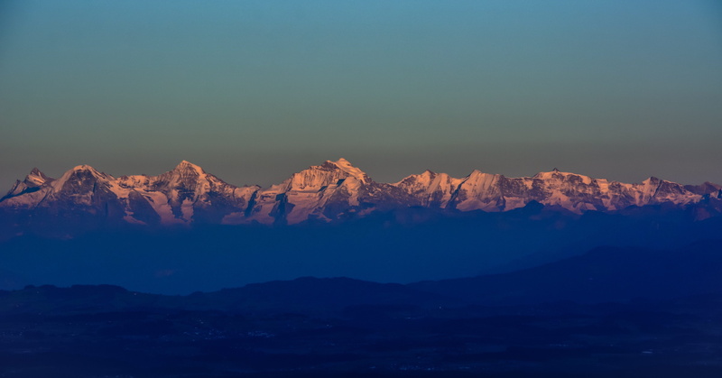 tranquil scene, tranquility, bernese alps, mountains, rock - object, outdoors, travel destinations, idyllic, landscape, rock, geology, twilight, rock formation