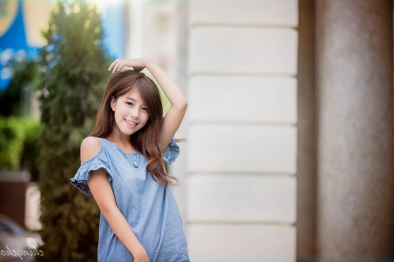 one person, waist up, long hair, standing, chingcho taiwanese asian women taiwan, smiling, focus on foreground, hairstyle, women, child, beautiful woman