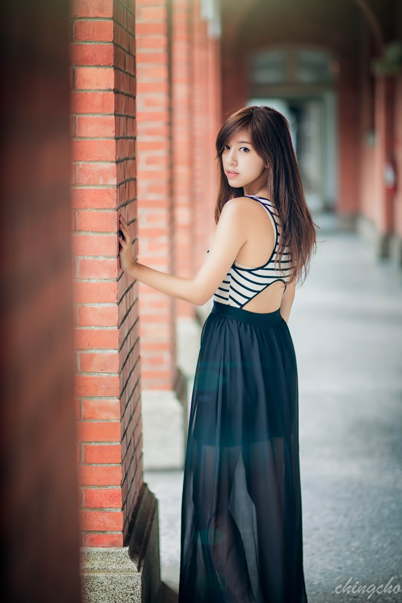brick, beautiful woman, lifestyles, beauty, portrait, 5K, brunette, fashion, hair, smiling, looking back, eyeliner, Asian, one person, black skirts, long hair