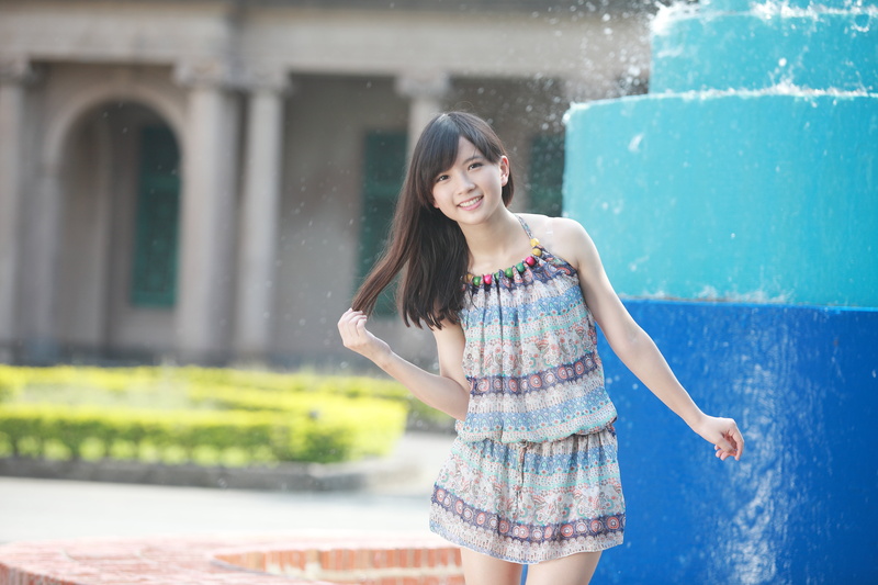 smiling, model, hairstyle, women, real people, one person, portrait, casual clothing, standing, happiness, looking at camera, focus on foreground, outdoors