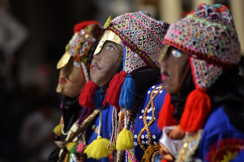 scarf, 8K, outdoors, art and craft, cusco peru, traditional clothing, focus on foreground, multi colored, quechua, retail, carnival in peru, representation