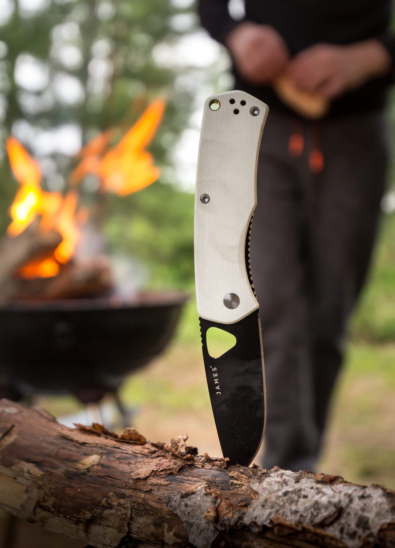 branch, people, product, flame, woods, pocketknife, metal, black, outdoors, wood - material, heat - temperature, log, wood, body part, pruner, rock - object