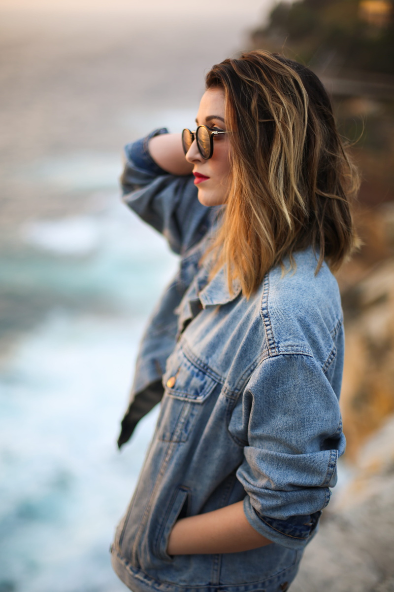 sea, cliff, sydney, ocean, water, side profile, denim, style, beauty, model, beautiful woman, lifestyles, woman, looking away, jeans, sunglasses, casual clothing