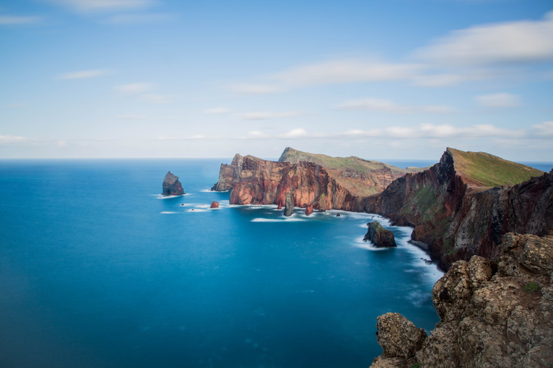 tranquil scene, aerial, rocks, nautical vessel, horizon, photography, horizon over water, day, landscape, solid, tranquility, sky, rock formation, surrounded