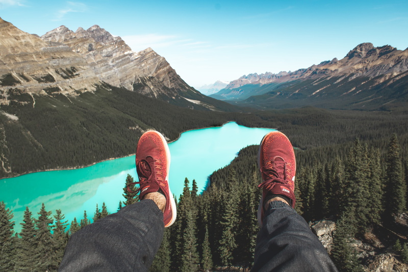 national, front, jeans, feet, person, water, leisure activity, tree, one person, red, single, sky, beauty in nature, woodland, shoe, legs, real people