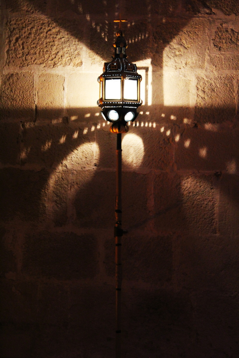 shadow game, lantern, lamp, brick, built structure, cathar lamp, no people, indoors, electric light, light, ceiling, night, brick wall, architecture, light - natural phenomenon
