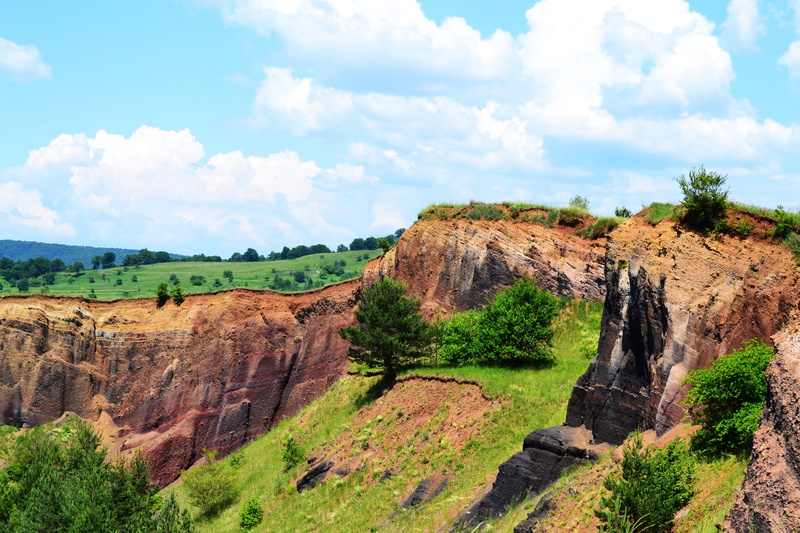 day, red, cloud - sky, tranquil scene, eroded, mountain, solid, outdoors, rock formation, scenics - nature, formation, racos, non-urban scene, land, plant