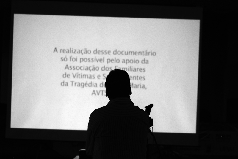 dark, people, whiteboard, documentary, brasil, real people, film, waist up, silhouette, men, janeiro 27, education, rear view, indoors, sitting, western script