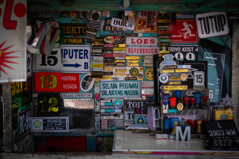 indonesia, street photography, no people, flat, script, information, text, architecture, choice, communication, multi colored, western script, outdoors
