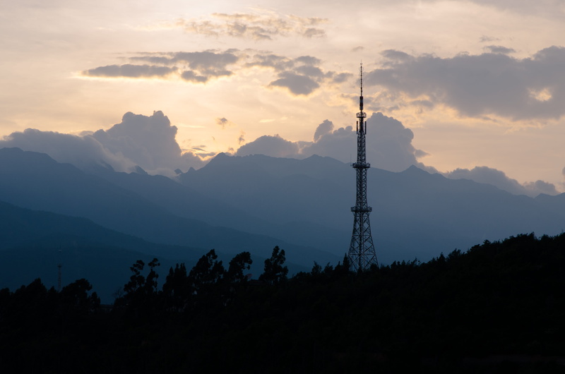 cloud - sky, dusk, broadcasting, mountain, nature, technology, global communications, non-urban scene, sunrise, mountain range, tree, landscape, built structure