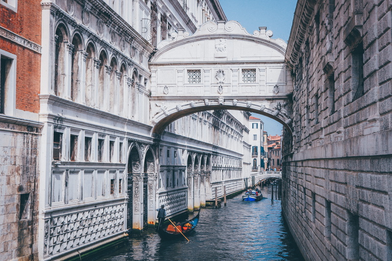 arch, boat, outdoors, gondola - traditional boat, tourism, italy, passing, building, connection, built structure, man, travel destinations, sigh, venice