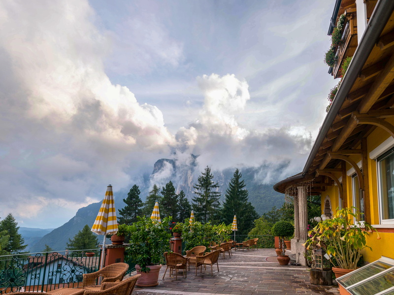 mountains, travel destinations, building, outdoors, south tyrol, plant, trento, sky, nature, hotel, italy, built structure, tyrol, staircase, architecture