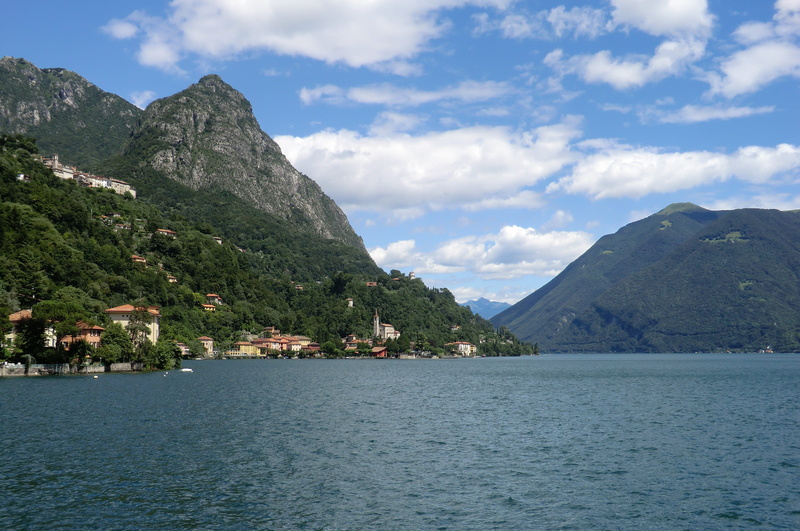mountain range, mountain peak, tranquil scene, travel, waterfront, panoramic, no people, tree, landscape, nature, tranquility, day, cloud - sky, formation