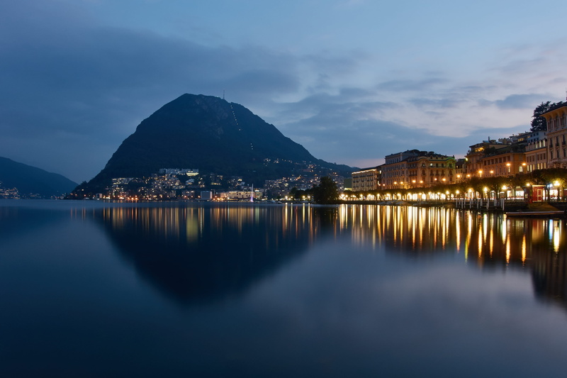 building, lake, scenics - nature, built structure, reservoir, outdoors, beside, body, scenery, mountain, pier, lagoon, weather, no people, houses, tranquility