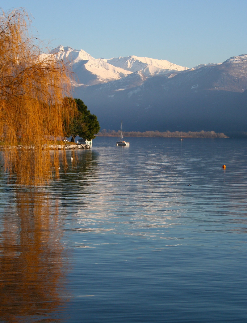 sail, boat, reflection, mountain range, beauty in nature, mirrors, mountains, snow, scenics, landscape, nature, blue, lugano, tranquility, transportation