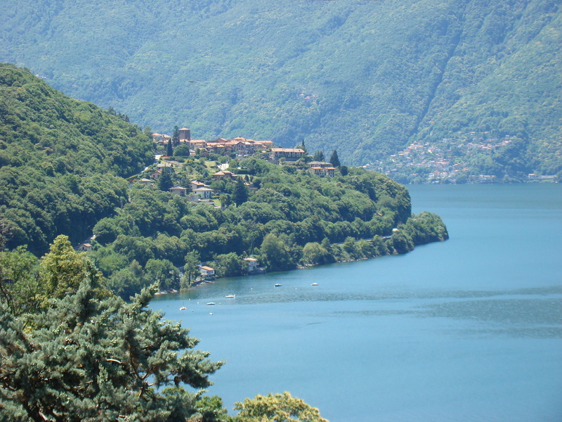 village, beauty in nature, 2K, lake, switzerland, building exterior, tree, green color, built structure, day, no people, outdoors, ticino, land, caviano