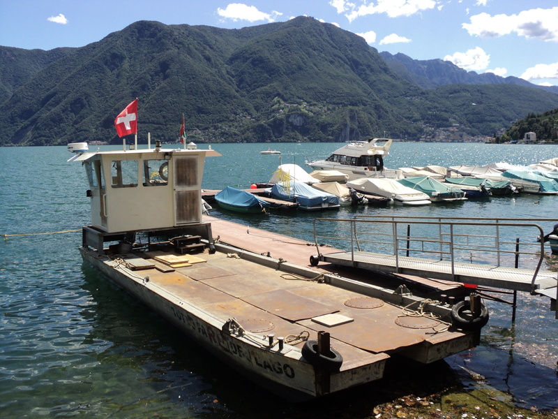 lake, day, nature, sea, water, switzerland, lugano, no people, sky, outdoors, flag, nautical vessel, moored, harmony, mode of transportation, alpine, bank